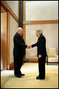 Vice President Dick Cheney is greeted Wednesday, Feb. 21, 2007, by Japan's Emperor Akihito at the Imperial Palace in Tokyo. White House photo by David Bohrer