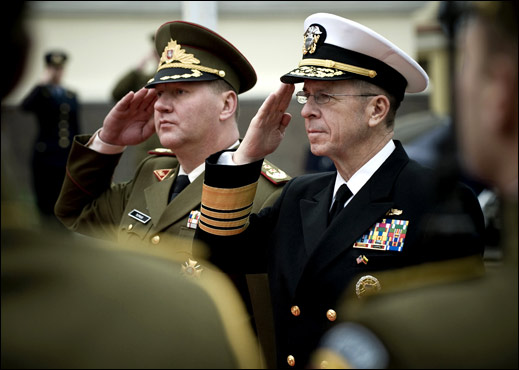 U.S. Navy Adm. Mike Mullen, chairman of the Joint Chiefs of Staff, and Lt. Gen. Valdas Tutkus, chief of defense, Republic of Lithuania, salute during the playing of national anthems for their countries at a ceremony welcoming Mullen to Vilnius, Lithuania, Oct. 22, 2008. DoD photo by U.S. Navy Petty Officer 1st Class Chad J. McNeeley