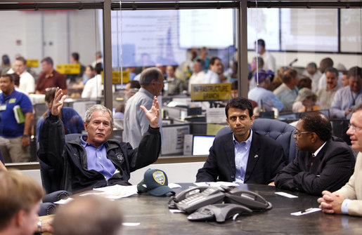 President George W. Bush speaks with federal, state and local officials at the Louisiana Emergency Operations Center in Baton Rouge, Wednesday, Sept. 3, 2008, where he was briefed in the aftermath of Hurricane Gustav. Gustav was a Category 2 storm when it made landfall Monday, in Cocodrie, La. At the request of Gov. Bobby Jindal, center, President Bush Tuesday issued a Major Disaster Declaration for 34 of the state's parishes. Baton Rouge Mayor Kip Holden listens at right. White House photo by Eric Draper