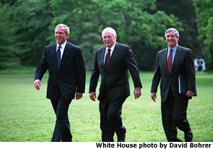 Photograph of the President, Vice President and former Chief of Staff walking across the White House Lawn. White House photo by David Bohrer.