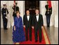 President George W. Bush and Mrs. Laura Bush welcome Italian Prime Minister Silvio Berlusconi Monday evening, Oct. 13, 2008, to the North Portico of the White House for a State Dinner in his honor. White House photo by Chris Greenberg