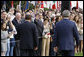 Crowds on the South Lawn of the White House cheer President George W. Bush and Italian Prime Minister Silvio Berlusconi Monday, Oct. 13, 2008, during the official welcoming ceremony for the prime minister. White House photo by Eric Draper