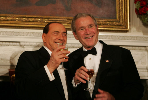 President George W. Bush and Italian Prime Minister Silvio Berlusconi raise their glasses in a toast Monday evening, Oct. 13, 2008, during a State Dinner in honor of Prime Minister Berlusconi's visit to the White House. White House photo by Joyce N. Boghosian