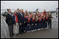 President George W. Bush and First Lady Laura Bush pose with members of the 2008 Little League World Series Championship team at Charleston Air Force Base in Charleston, S.C., Friday, October 10, 2008. White House photo by Chris Greenberg