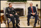 President George W. Bush meets with U.S. Army General David Petraeus, former Commander of the Multi-National Force in Iraq, Wednesday, Sept. 17, 2008, in the Oval Office at the White House. In speaking to reporters President Bush honored and congratulated General Petraeus for his outstanding command leadership in Iraq, and thanked him for agreeing to be the new commander of CENTCOM. White House photo by Eric Draper