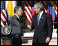 President George W. Bush shakes hands with Colombian President Alvaro Uribe following a joint press availability Saturday, Sept. 20, 2008, in the Rose Garden at the White House. White House photo by Eric Draper