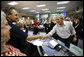 President George W. Bush greets and thanks personnel at the Emergency Operations Center in Austin, Texas, Monday, Sept. 1, 2008, following a briefing update on Hurricane Gustav. White House photo by Eric Draper