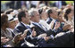 President George W. Bush sits with Panama's Ambassador to the United States Frederico A. Humbert, during festivities Thursday, Oct. 9, 2008, celebrating Hispanic Heritage Month on the South Lawn at the White House. White House photo by Eric Draper