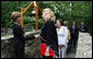 Mrs. Laura Bush greets the directors of Presidential Libraries Wednesday, June 4, 2008, at the entrance to Camp David's Evergreen Chapel in Thurmont, Maryland. Mrs. Bush shakes hands with Ms. Nancy Smith, Director of the National Archives' Presidential Material Staff in Alexandria, VA. White House photo by Shealah Craighead