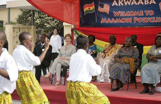 Mrs. Laura Bush watches a children's dance performance during welcome ceremonies Wednesday, Feb. 20, 2008, at the Maamobi Polyclinic health facility in Accra, Ghana. White House photo by Shealah Craighead