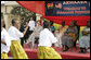 Mrs. Laura Bush watches a children's dance performance during welcome ceremonies Wednesday, Feb. 20, 2008, at the Maamobi Polyclinic health facility in Accra, Ghana. White House photo by Shealah Craighead