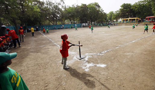 Kids play a tee ball game during the President's visit Wednesday, Feb, 20 2008, at the Ghana International School in Accra, Ghana. White House photo by Eric Draper