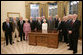 President George W. Bush meets with the members of the Supreme Headquarters Allied Expeditionary Force/Headquarters European Theater of Operations U.S. Army Veterans Association Friday, Oct. 6, 2006, in the Oval Office at White House. The group was organized in 1985 as a way to pay tribute to the memory of their supreme commander, Dwight D. Eisenhower, and their visit to the White House marks their 21st and final reunion gathering. White House photo by Paul Morse