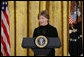 Mrs. Laura Bush welcomes invited guests Tuesday, Feb. 26, 2008 to the East Room of the White House, for the launch of the National Endowment for the Humanities’ Picturing America initiative, to promote the teaching, study, and understanding of American history and culture in schools. White House photo by Chris Greenberg