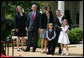 President George W. Bush and Secretary of Education Margaret Spellings join Mike Geisen, the 2008 National Teacher of the Year, and his family as they celebrate the 7th grade teacher's honors Wednesday, April 30, 2008, in the Rose Garden of the White House. Family members include Mr. Geisen's wife, Jennifer, and their children, Johanna, 8, and Aspen, 6. White House photo by Joyce N. Boghosian