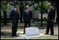 President George W. Bush joins Canadian Prime Minster Stephen Harper and Mexico’s President Felipe Calderon as they stand over a monument commemorating the leader’s tree planting in honor of Earth Day Tuesday, April 22, 2008 at Lafayette Square in New Orleans. White House photo by Chris Greenberg