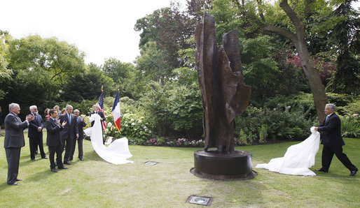 President George W. Bush and Laura Bush, accompanied by French President Nicolas Sarkozy, attend the unveiling of the Flamme de la Liberte sculpture Saturday, June 14, 2008, at the U.S. Ambassador's residence in Paris. White House photo by Eric Draper