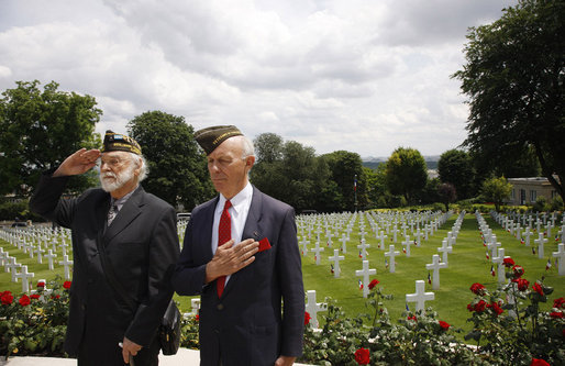 Two U.S. World War II veterans salute during the wreath-laying ceremony Saturday, June 14, 2008, at the Suresnes American Cemetery and Memorial in Suresnes, France. White House photo by Eric Draper