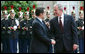 President George W. Bush is welcomed by French President Nicolas Sarkozy for a dinner Friday evening, June 13, 2008, at the Elysee Palace in Paris. White House photo by Chris Greenberg