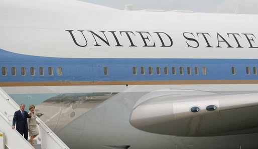 President George W. Bush and Laura Bush walk down the stairs from Air Force One on their arrival Friday, June 13, 2008, to Orly Airport in Paris. White House photo by Shealah Craighead