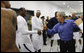 President George W. Bush shares a moment with U.S. Olympic Men's Basketball Team member LeBron James and other members of the team Sunday, Aug. 10, 2008, during a visit with the team prior to their game against China at the 2008 Summer Olympic Games in Beijing. White House photo by Eric Draper