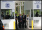 President George W. Bush listens as Ed Cassidy, Assistant Director of U.S. Customs and Border Protection, explains the procedures at a simulated border crossing during in a tour Tuesday, May 29, 2007, of the Federal Law Enforcement Training Center in Glynco, Ga. The President spent the day in Georgia where he was briefed on wildfires and also delivered remarks on comprehensive immigration reform. White House photo by Eric Draper