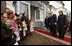 President George W. Bush and Mrs. Laura Bush joined by Ukrainian President Viktor Yushchenko and his wife, first lady Kateryna Yushchenko, are greeted by children, April 1, 2008, before touring St. Sophia's Cathedral in Kyiv, Ukraine.