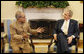 President George W. Bush welcomes India's Minister of External Affairs Pranab Kumar Mukherjee to a meeting in the Oval Office Monday, March 24, 2008, at the White House. White House photo by Eric Draper