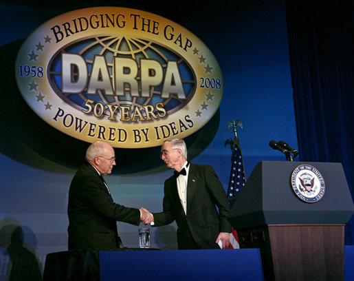 Vice President Dick Cheney is welcomed by Deputy Secretary of Defense Gordon England Thursday, April 10, 2008, to deliver the keynote speech at the Defense Advanced Research Projects Agency 50th anniversary celebration in Washington, D.C. The Vice President congratulated DARPA on its history of achieving significant technological breakthroughs to aid in U.S. defense and national security. White House photo by David Bohrer