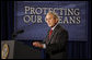 President George W. Bush delivers remarks on U.S. Ocean Action Plan Friday, Sept. 26, 2008, at the Smithsonian Museum of Natural History. The U.S. Ocean Action Plan established a coordinated ocean governance structure to enhance leadership and coordination among the Federal agencies with ocean-related responsibilities and activities. President Bush stated in his remarks, "Under the Ocean Action Plan we've worked to stop over-fishing. Last year, I issued an executive order protecting two of our nation's most popular game fish -- striped bass and red drum. I signed important legislation reauthorizing the Magnuson Stevenson Act, which sets a firm deadline to end over-fishing in America by 2011." White House photo by Eric Draper