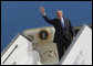 President George W. Bush stands at the top of the stairs to Air Force One Wednesday morning, Jan. 9, 2008, after arriving at Ben Gurion International Airport for the start of his Mideast visit. White House photo by Eric Draper