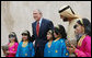 President George W. Bush and Sheikh Mohammed Bin Rashid al-Maktoum, Vice President and Prime Minister of the United Arab Emirates, pose for photos with a children’s dance group welcoming President Bush, Monday, Jan. 14, 2008, during a visit to Sheikh Saeed Al Maktoum House in Dubai. White House photo by Eric Draper