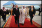 President George W. Bush and King Abdullah bin Abdul Al-Aziz walk the red carpet at Riyadh-King Khaled International Airport after the President arrived Monday, Jan. 14, 2008, in Riyadh, Saudi Arabia on the final stop of his Mideast visit. White House photo by Eric Draper