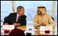 With Dubai as a backdrop, President George W. Bush and Sheikh Mohammed bin Rashid Al Maktoum participate in a roundtable discussion Monday, Jan. 14, 2008, with young Arab leaders at the Burj Al Arab Hotel. White House photo by Eric Draper