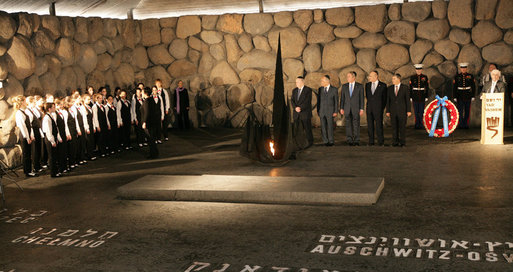 President George W. Bush listens to the Ankor Children's choir during his visit Friday, Jan. 11, 2008, to the Hall of Remembrance at Yad Vashem, the Holocaust Martyrs' and Heroes' Remembrance Authority established in 1953 by an act of the Israel Knesset in Jerusalem. White House photo by Chris Greenberg