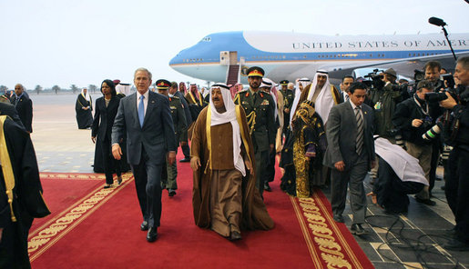 President George W. Bush and Amir Shaykh Sabah Al-Ahmed Al-Jaber Al Sabah walk a red carpet to arrival ceremonies Friday, Jan. 11, 2008, at Kuwait International Airport in Kuwait City after the President arrived from Israel on the second stop of his eight-day, Mideast visit. White House photo by Eric Draper