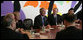 President George W. Bush smiles as he joins fellow APEC leaders during a dialogue Saturday, Sept. 8, 2007, with members of the APEC Business Advisory Council at the Sydney Opera House in Sydney, Australia. White House photo by Eric Draper