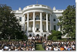 President George W. Bush addresses the NCAA 2006 and 2007 championship Teams during a ceremony Friday, Sept. 21, 2007, on the South Lawn. "Because you're a champ on the field, you have a chance to inspire somebody to make right choices in life," said President Bush in his remarks. "You have the opportunity to set a good example. You don't know how many youngsters are looking at you, but there's a lot. People are wondering how champs behave. So by setting high standards and working hard to achieve them, you're influencing other people." White House photo by Chris Greenberg