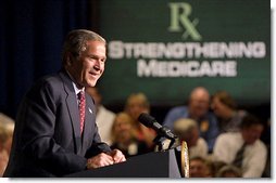 President George W. Bush remarks on improving prescription drug coverage in Minneapolis, Minn., during a full day of discussions about strengthening America's Medicare system Thursday, July 11. White House photo by Paul Morse.