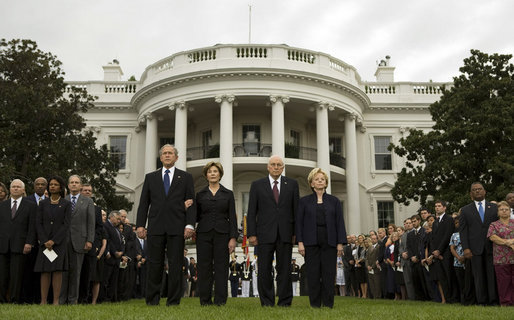 President George W. Bush and Mrs. Laura Bush and Vice President Dick Cheney and Mrs. Lynne Cheney stand at attention during the observance Thursday, Sept. 11, 2008, on the South Lawn of the White House of the seventh anniversary of the September 11 terrorist attacks. White House photo by Eric Draper