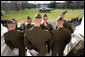 Marines from Quantico Marine Base Delta Company 1st Platoon look on as President George W. Bush boards Marine One before departing the White House for his trip to Fredericksburg, Virginia, Monday, Dec. 17, 2007. White House photo by Eric Draper