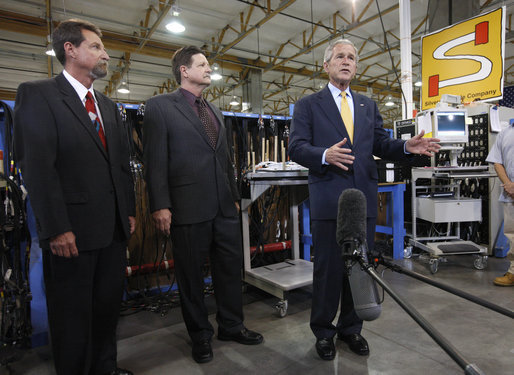 President George W. Bush delivers a statement to the media following his tour of the production floor at the Silverado Cable Company in Mesa, Arizona, Tuesday, May 27, 2008. Also pictured are Bob Simpson Jr. President of Silverado Cable Company and Mitch Simpson, Vice President of Silverado Cable Company. White House photo by Eric Draper