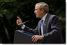 President George W. Bush addresses the media during a Rose Garden news conference Wednesday, July 30, 2003. President Bush discussed many topics including progress in Iraq, the Middle East, and the economy.  White House photo by Paul Morse