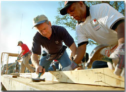 President George W. Bush works on a Habitat For Humanity house in Tampa, Fl., Tuesday, June 5.