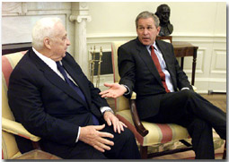 President Bush talks to Israeli Prime Minister Ariel Sharon in the Oval Office Tuesday, June 26. White House photo by Paul Morse