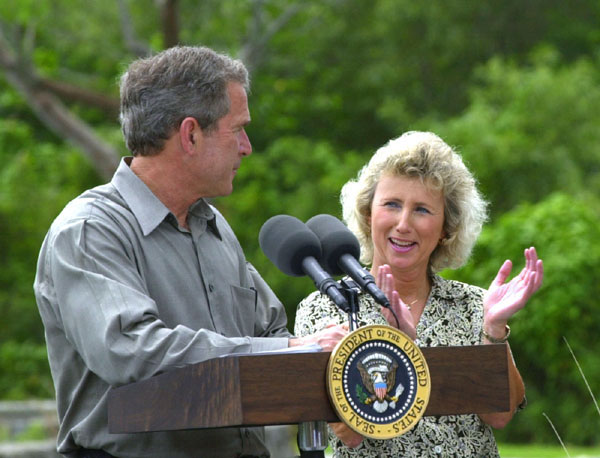 President George W. Bush looks to Fran Maniella after announcing her as Director of National Parks Service during remarks at Royal Palm Visitors Center at Everglades National Park in Florida, Monday June 4. WHITE HOUSE PHOTO BY ERIC DRAPER