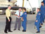 From left, Dryden Deputy Director Steve Schmidt and Dryden Shuttle Program Manager Joe D'Agostino greet Discovery Commander Eileen Collins and the crew.