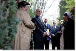 President George W. Bush speaks with actors Jim Curtis and Mattie Jones during his visit Monday, Nov. 19, 2007, to the Thanksgiving Shrine at Berkeley Plantation in Charles City, Virginia. The President made his Thanksgiving remarks at the landmark first settled in 1619 by Englishman and Capt. John Woodlief. White House photo by Chris Greenberg