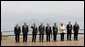 With Lake Toya as a backdrop, leaders of the Group of Eight pose for the official family photograph Tuesday, July 8, 2008, in Toyako, Japan. White House photo by Eric Draper