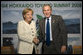 President George W. Bush and Germany's Chancellor Angela Merkel shake hands after meeting Tuesday, July 8, 2008, at the G-8 Summit in Toyako, Japan. White House photo by Eric Draper